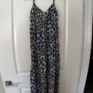 Spaghetti strap peacock-feather print maxi dress. Super comfy fit.
